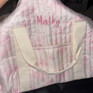 Gabi added a photo of their purchase