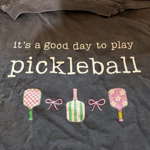 Alexandra added a photo of their purchase