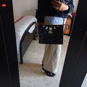 Laura added a photo of their purchase