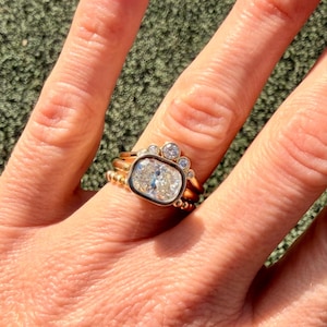 Adrienne added a photo of their purchase