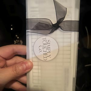 Juliet added a photo of their purchase