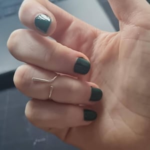 Cristina added a photo of their purchase