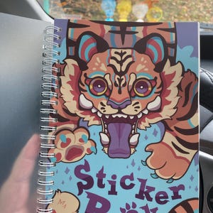 Gwenyth added a photo of their purchase