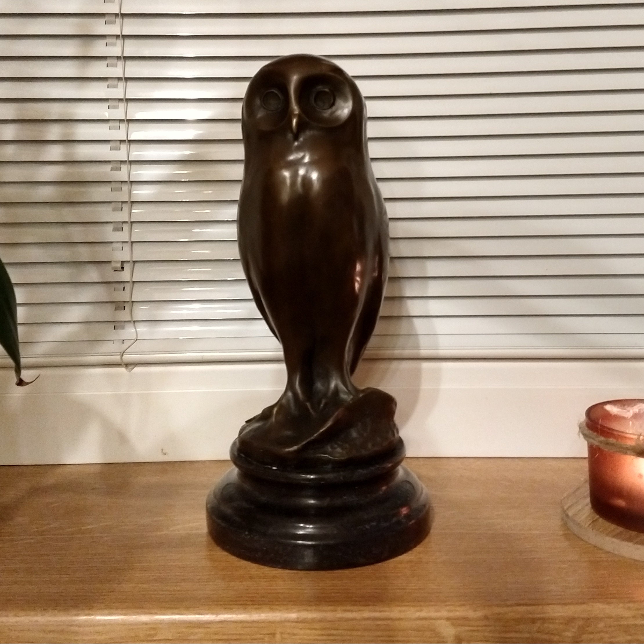 Bronze statue of a wise owl in Artdeco style