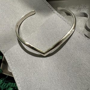 Gina added a photo of their purchase