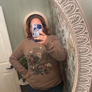 Sarah added a photo of their purchase