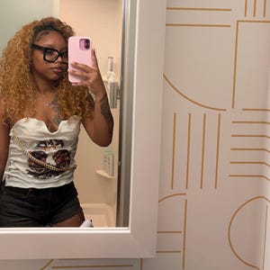 Tatyana added a photo of their purchase