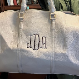Maggie added a photo of their purchase