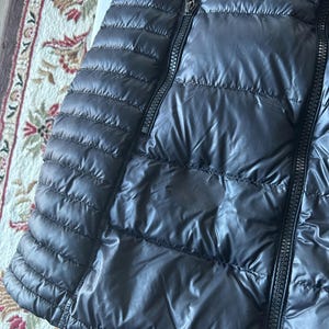 Sandra added a photo of their purchase