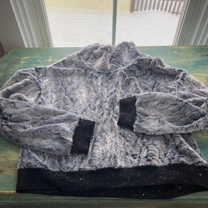 Susan added a photo of their purchase