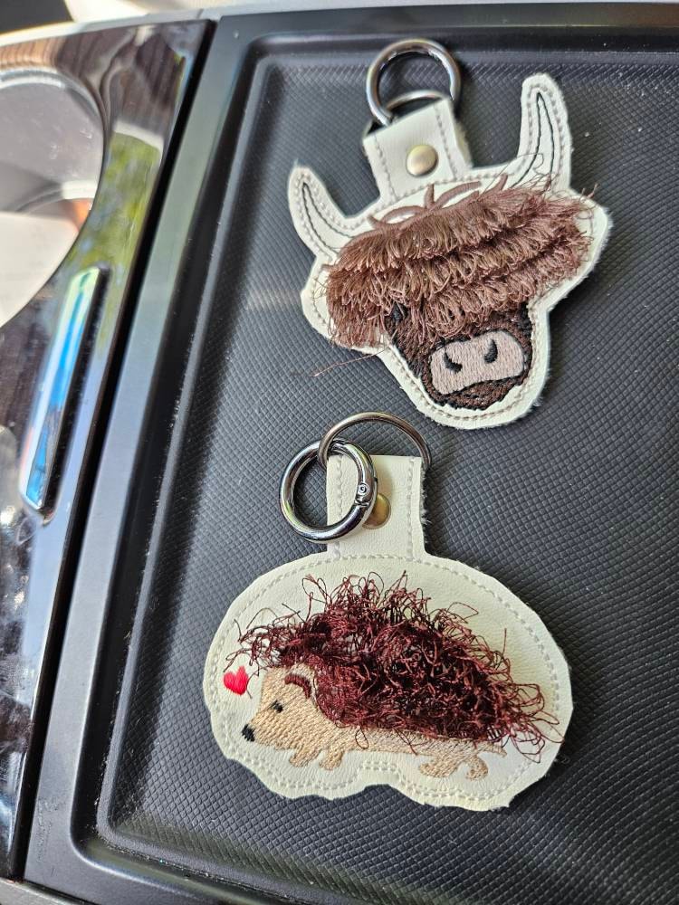 Fringed Highland cow keychain key fob snap tab in the hoop machine embroidery designs ITH project Awesome fluffy fur cow kids backpack tag