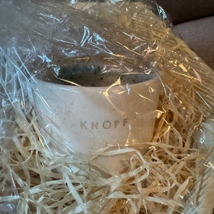 Aline added a photo of their purchase