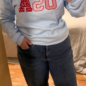 Ellen added a photo of their purchase