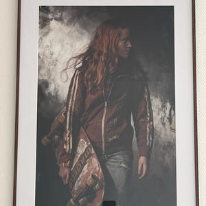 Melinda added a photo of their purchase