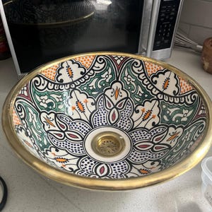 Nermine added a photo of their purchase