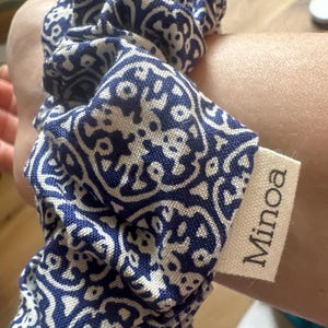 Nina added a photo of their purchase