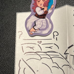 Sara added a photo of their purchase