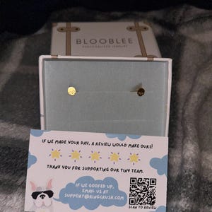 Customer photo, Skull Earrings