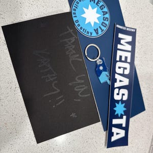 Kathryn added a photo of their purchase