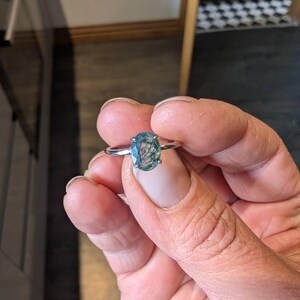 Carmen added a photo of their purchase