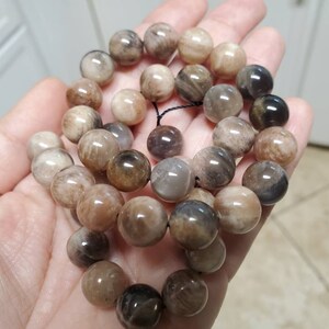 Crazy Lace Agate, Dyed Blue, Smooth Round in sizes 4mm, 6mm, 8mm & 10mm. Priced Per Strand