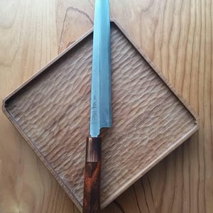 Tat-ki added a photo of their purchase