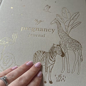 Sarah added a photo of their purchase