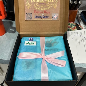 Nancy added a photo of their purchase