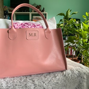Dhom added a photo of their purchase