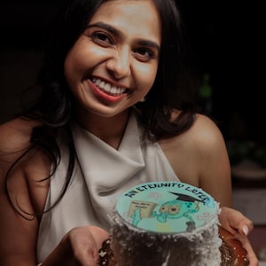 Nisha added a photo of their purchase