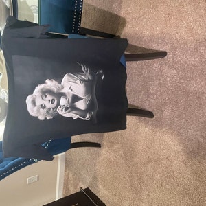 Marilyn added a photo of their purchase