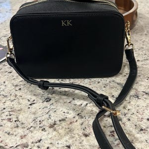 Kathryn added a photo of their purchase