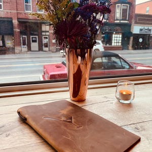 Kat added a photo of their purchase