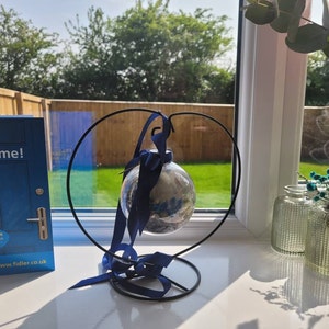 Kirstie added a photo of their purchase