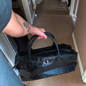 AJ added a photo of their purchase