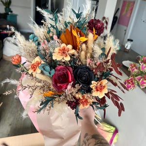 Alicia added a photo of their purchase