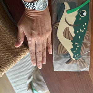 Angela added a photo of their purchase