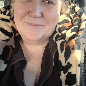 Sarah added a photo of their purchase