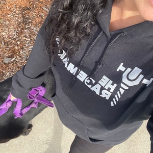 Sarah added a photo of their purchase