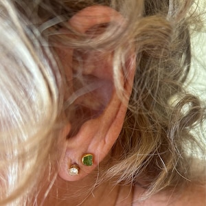 Customer photo from Kristie McMaster, Dainty Raw Peridot Stud Earrings