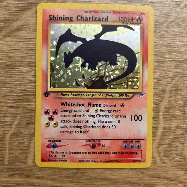 Shining Charizard 107/105 Gold Foil Pokemon Card First