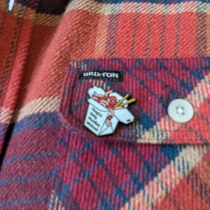 Dewi added a photo of their purchase