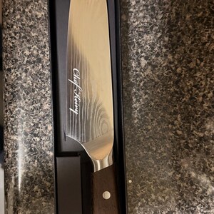 Carmela added a photo of their purchase