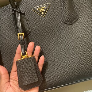 Prada Saffiano Cuir Double Bag Review - Extra Petite  Prada bag saffiano,  Prada saffiano, Prada double bag