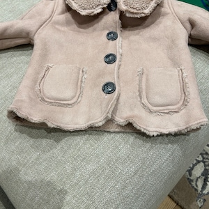Sharon added a photo of their purchase