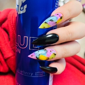 Amber Mancini added a photo of their purchase