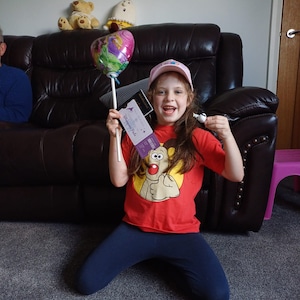 Sarah added a photo of their purchase