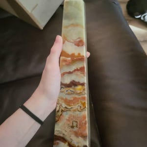 Paige added a photo of their purchase