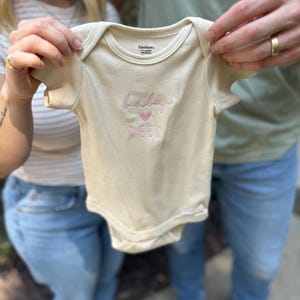 Kennedy added a photo of their purchase