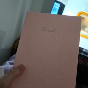 Sarah added a photo of their purchase